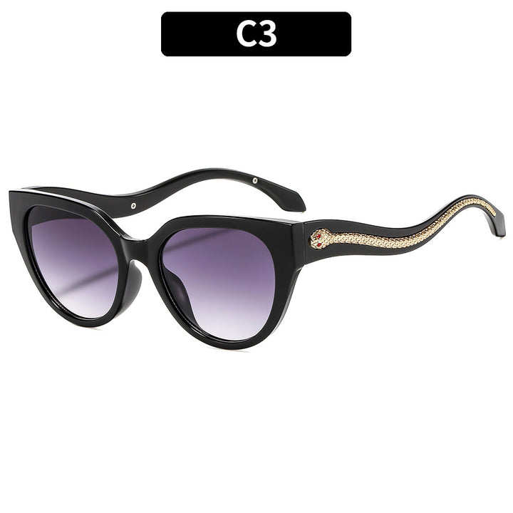 Chice Katzenauge Sonnenbrillen mit Schlangenakzenten