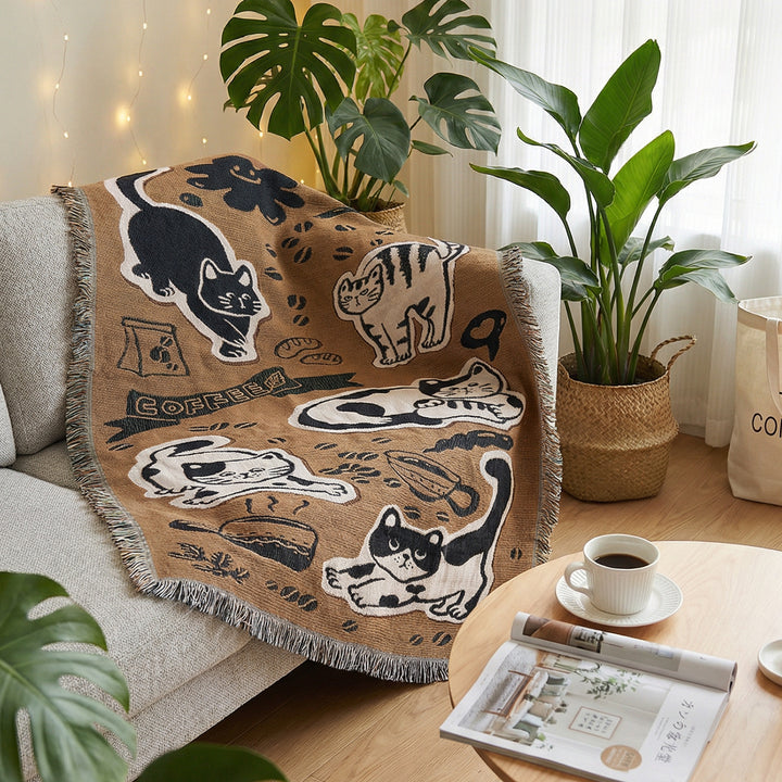 Verspielte katzenmotivierte Wurfdecke