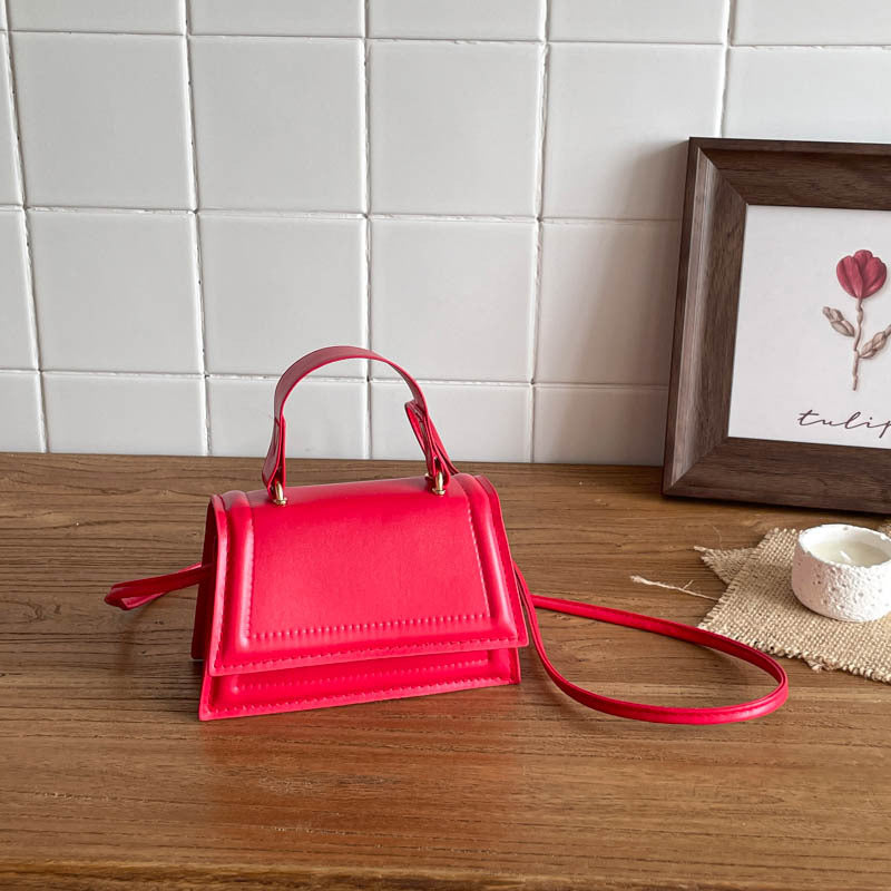 Strukturierte Mini-Crossbody-Handtasche