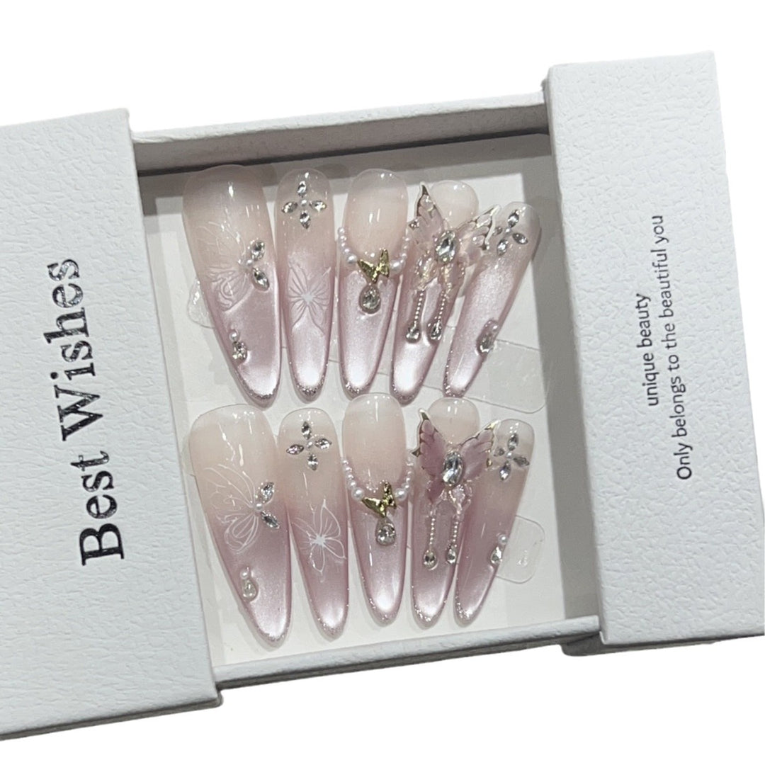 Künstlerisches Stiletto Press-On Nageldesign-Set mit Schmetterlings- und Edelsteinakzenten Karnz