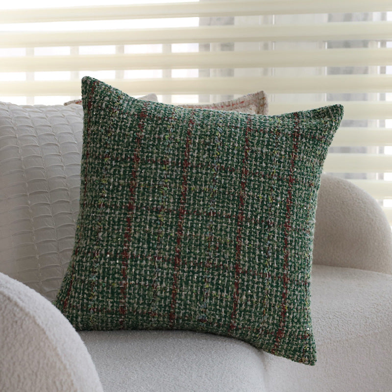 Quadratischer Bouclé-Kissenbezug im Tweedstil mit dezentem Multicolor‑Tufting Karnz