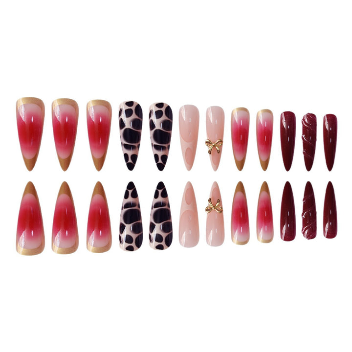 Künstlerisches Stiletto Press-On Nagelset mit einzigartigen Akzenten Karnz