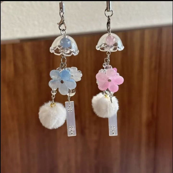 Dekorativer Blumen- und Pom Pom Charm Schlüsselanhänger Karnz