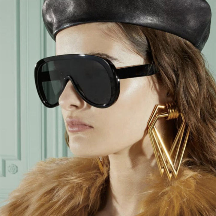 Damen futuristische Sportsonnenbrille mit breiter Sichtscheibe und UV-Schutz Karnz