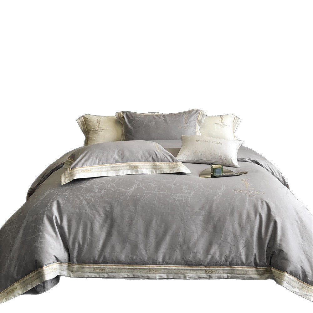 Luxuriöses Satin-Bettwäsche-Set mit dezenter Marmorstruktur und goldener Stickbordüre
