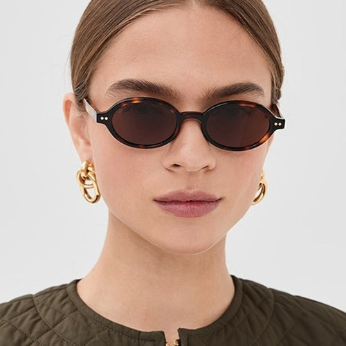 Damen modische ovalförmige Sonnenbrille mit ausgefallenem Rahmen Karnz