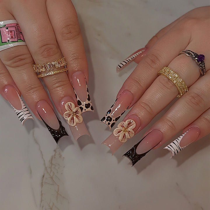 Künstlerische Press-On Nagelkunst Tipps mit floralen und Tierdruckdesigns Karnz