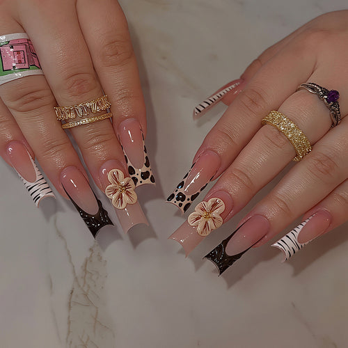 Künstlerische Press-On Nagelkunst Tipps mit floralen und Tierdruckdesigns Karnz