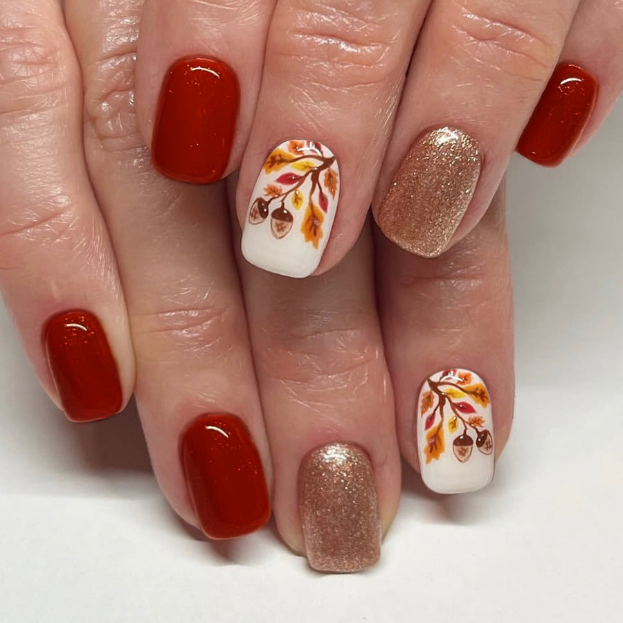 Künstlerische herbstliche Press-On Nagelkunst Karnz