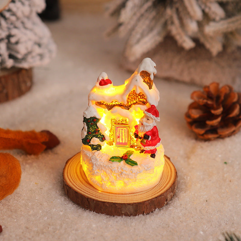 Weihnachtliche Miniaturbeleuchtung mit Schneeszenen Karnz