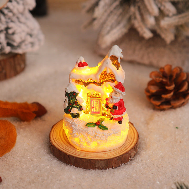 Weihnachtliche Miniaturbeleuchtung mit Schneeszenen Karnz