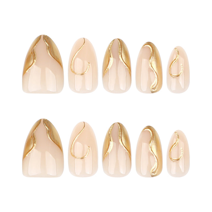 Kunstvolle Stiletto-Nägel mit eleganten Goldakzenten Karnz