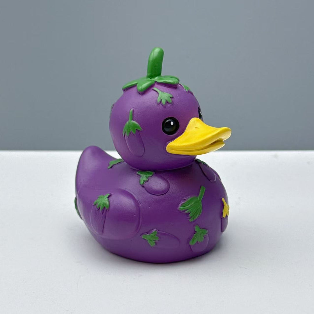 Lustige Gummi-Ente mit Gemüse-Motiv Karnz