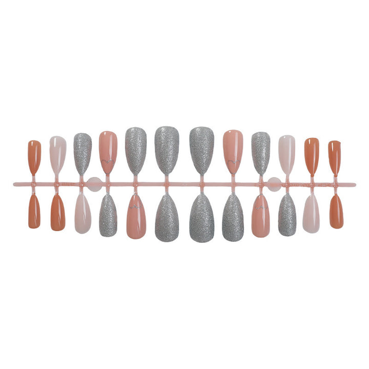 Kunstnagelset mit Herz- und Glitzer-Design Karnz