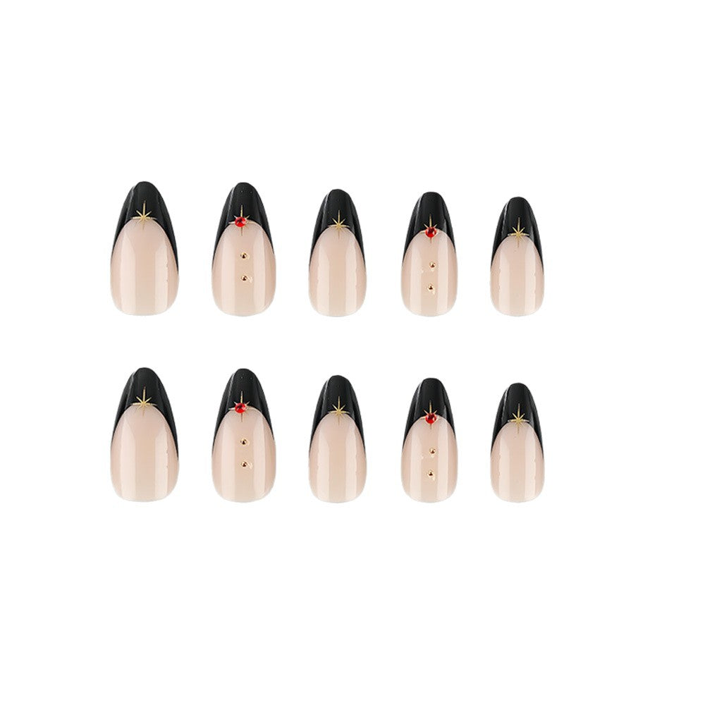 Glamouröse Kunstnägel Im Stilvollen Stiletto-Design mit Goldenen Akzenten Karnz