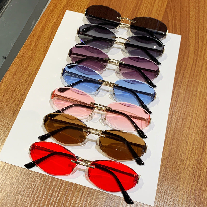 Damen Sonnenbrille im modernen Ovaldesign mit kontrastierendem Rahmen Karnz