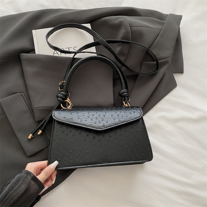 Strukturierte Lederhandtasche