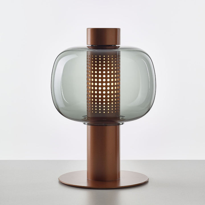 Künstlerische Tischlampe mit elegantem Glasschirm