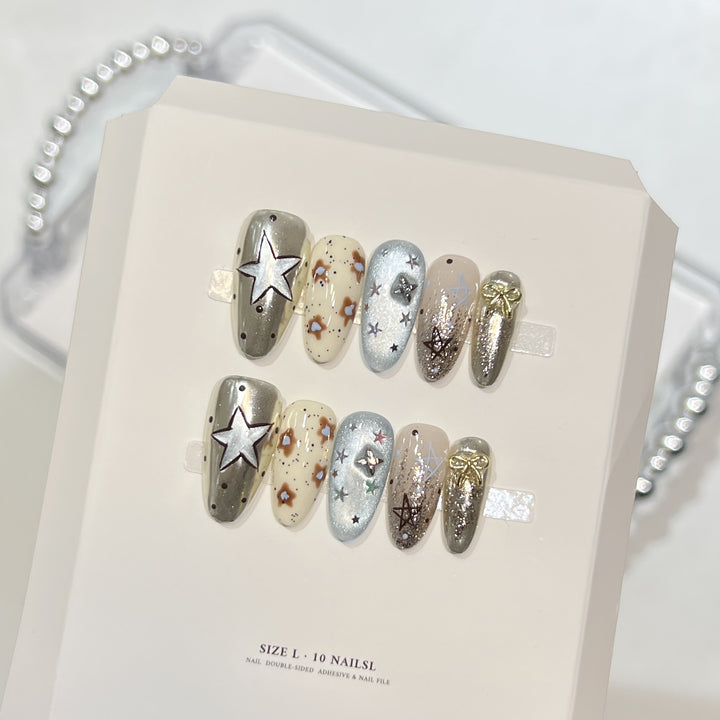 Künstlerisches Stiletto Press-On Nagelset mit einzigartigen ästhetischen Designs Karnz