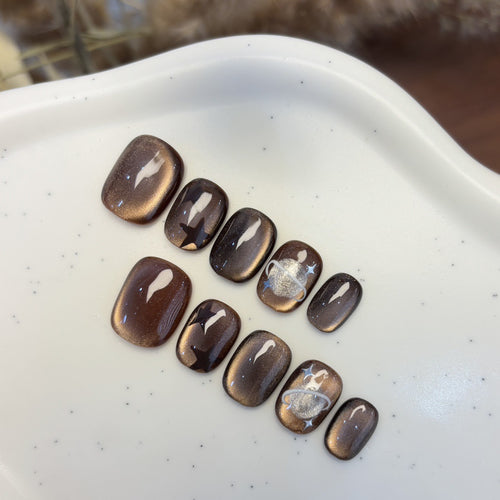 Kunstnagelset mit Sternen- und Planetendesign Karnz