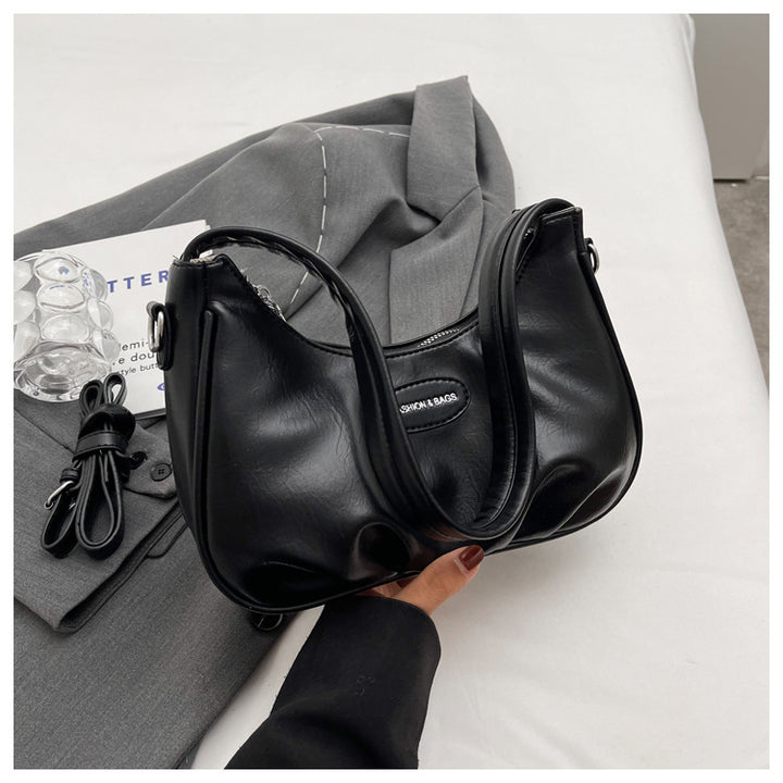 Moderne Kurven-Schultertasche Karnz