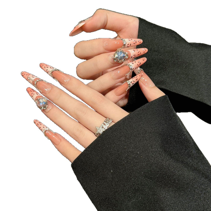 Künstlerische Stiletto Press-On Nägel mit glitzernden Akzenten