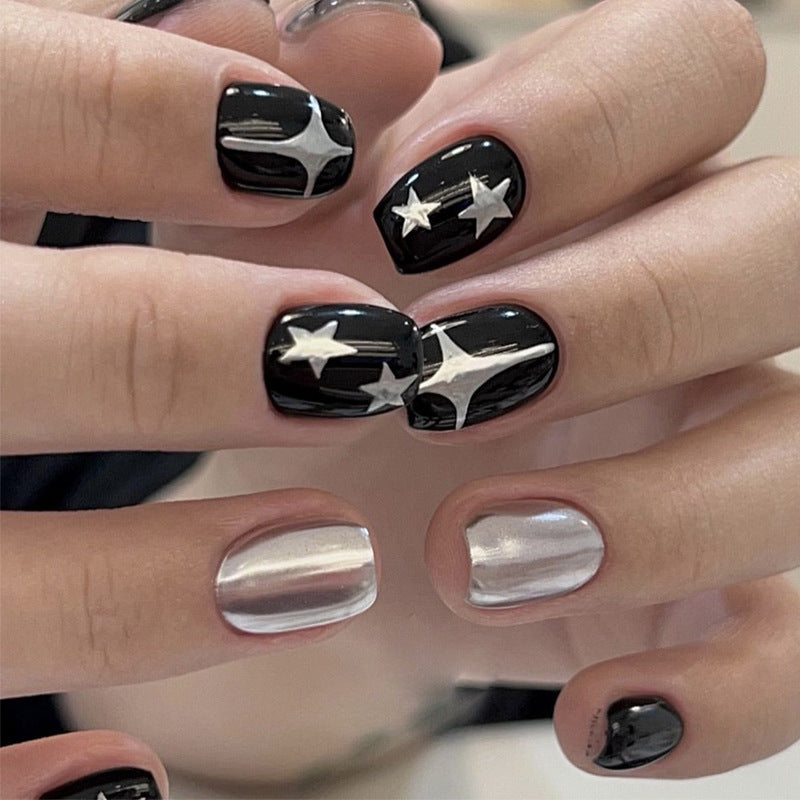 Künstlerisches Press-On-Nagelset mit metallischen Stern-Designs Karnz