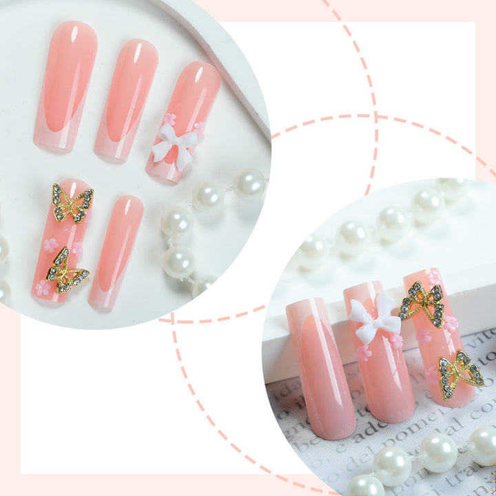 Dekoratives Press-On-Nagelset mit floralen und Schmetterlingsakzenten Karnz