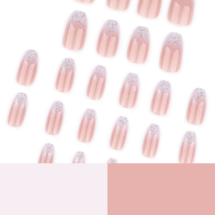 Kunstvolle Nagelverlängerungen mit Glitzer und Ombre-Effekt Karnz