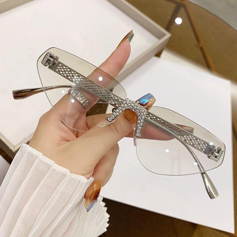 Damen Designer Katzenaugen-Sonnenbrille mit funkelndem Strass-Besatz Karnz