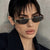 Damen elegante schmal geschnittene Sonnenbrille mit UV-Schutz Karnz