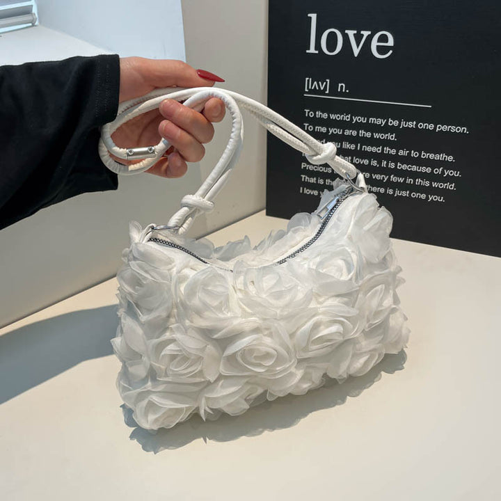 Blumenverzierte Handtasche