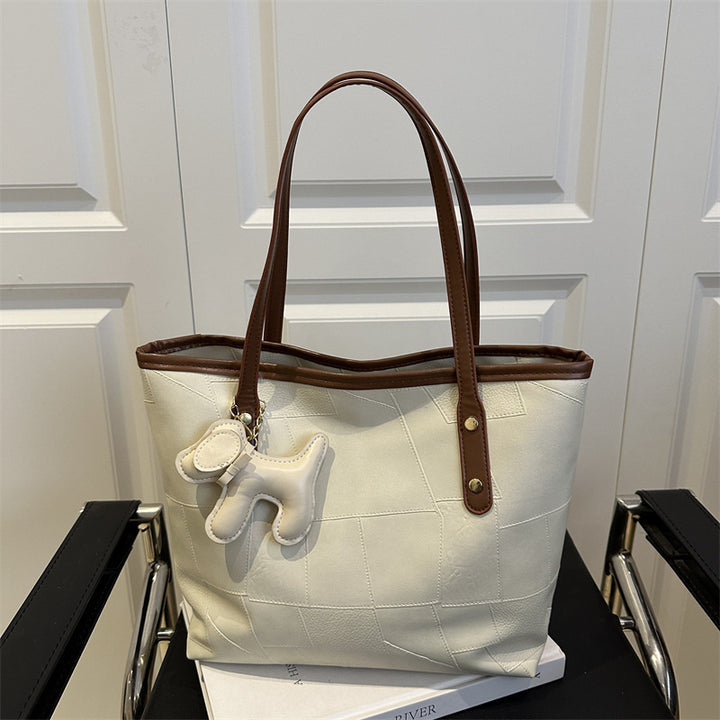 Stylische strukturierte Tragetasche mit dekorativem Charme