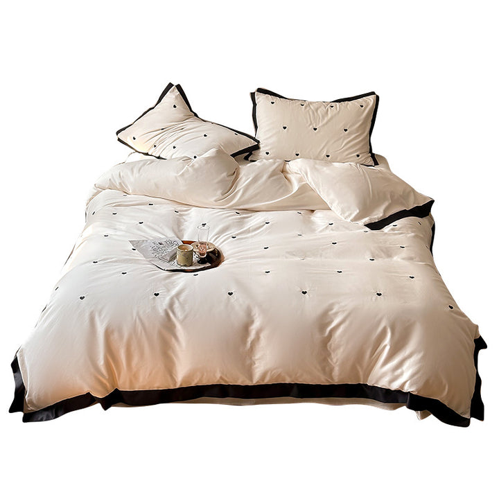 Bettwäsche-Set aus Baumwollsatin mit Mini-Herz-Stickerei und Kontrastpaspel Karnz
