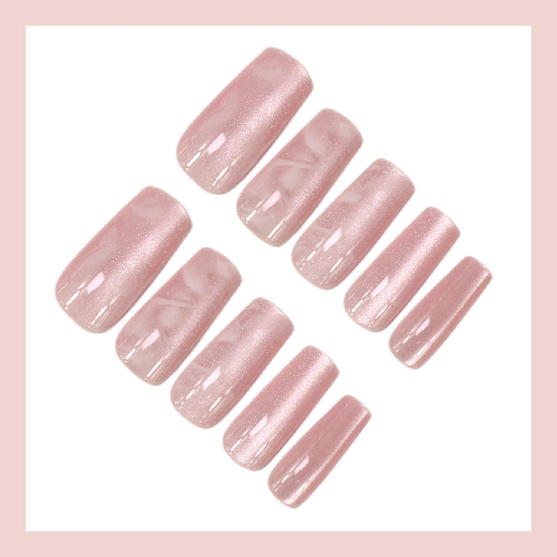 Kunstnagelset mit stilvollem Marmor-Design und Glitzerakzenten Karnz