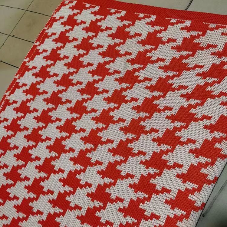 Hahnentrittmuster Strickwurfdecke