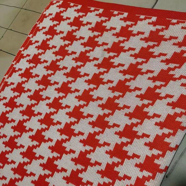 Hahnentrittmuster Strickwurfdecke