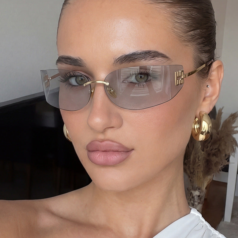 Damen futuristische Designer-Sonnenbrille mit ausgefallenem Rahmen und UV-Schutz Karnz