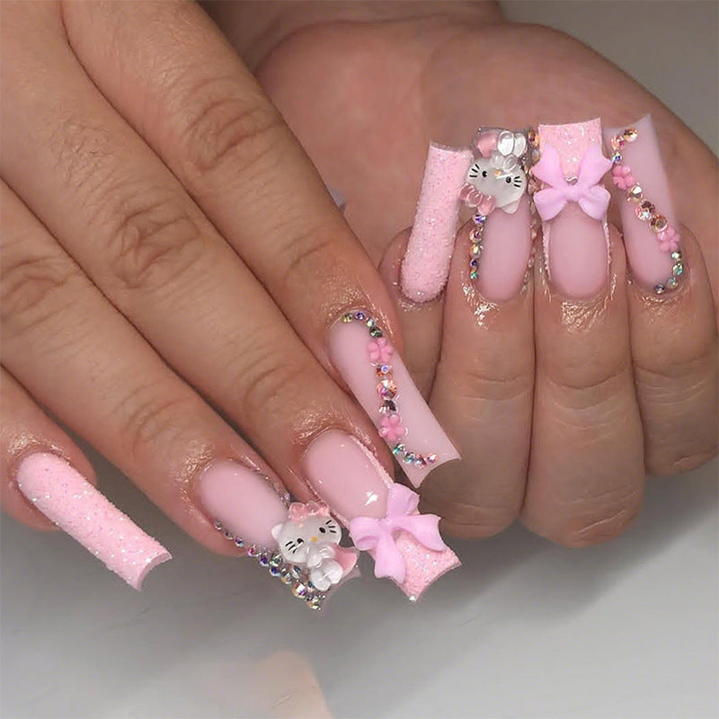 Dekorativer Premium Press-On Nagelset mit Strass- und Schleifenakzenten Karnz