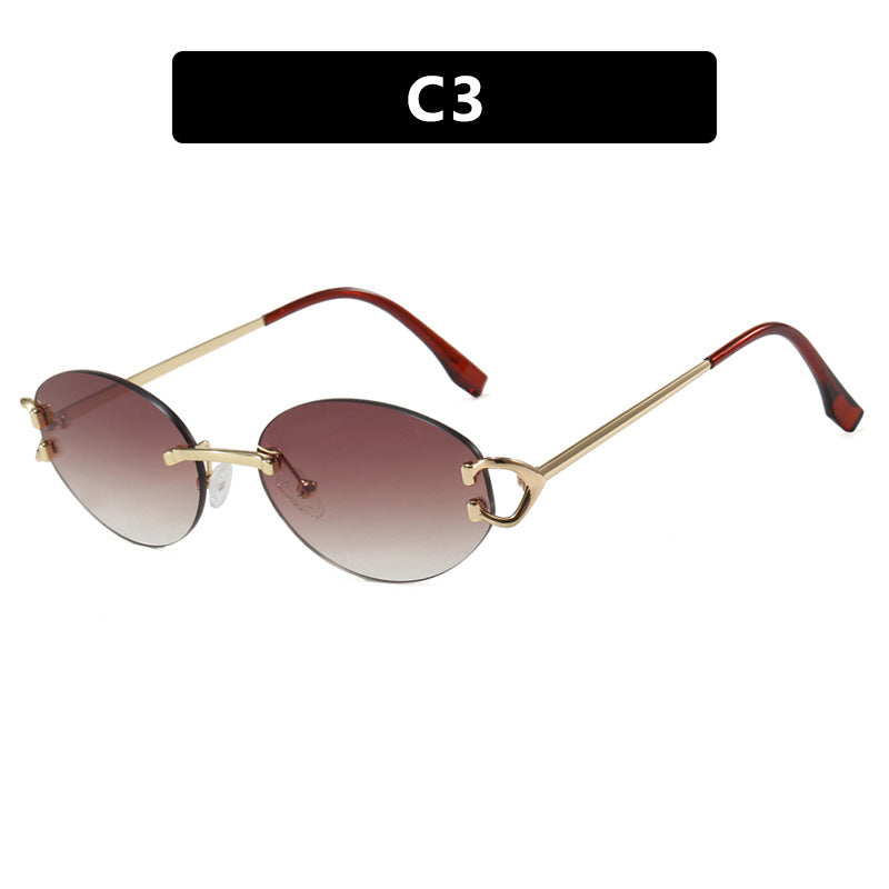 Damen elegante ovalförmige Sonnenbrille mit modischem Metallrahmen Karnz