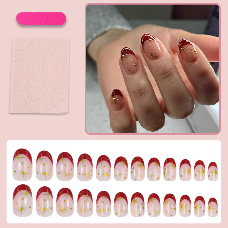 Kunstnagelset mit glamourösen Sternenmotiven und elegantem Farbverlauf Karnz