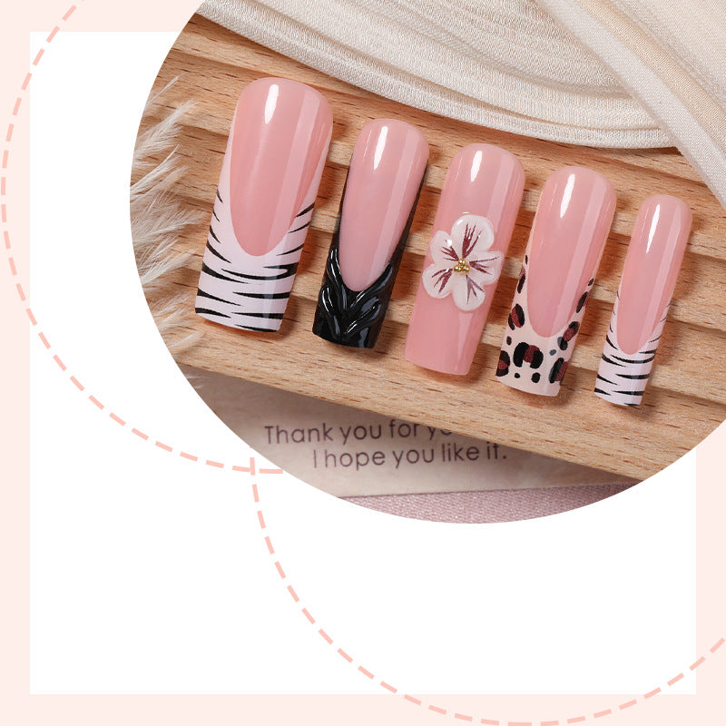 Künstlerisches Nagelkunst Press-On Set mit Blumen- und Tiermustern Karnz