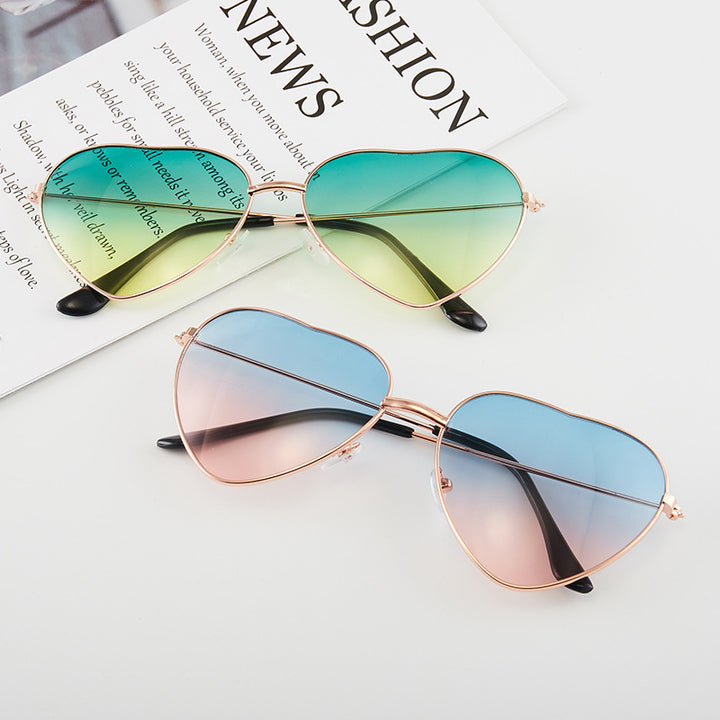 Damen Herzförmige Sonnenbrille mit UV-Schutz und elegantem Rahmen Karnz