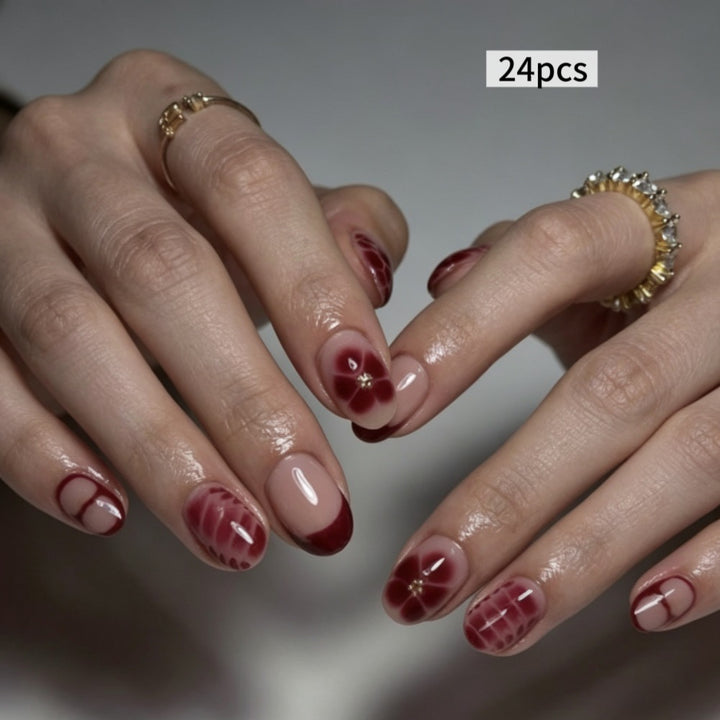 Elegante Kunstnägel mit Floralem Design und Glanz Karnz