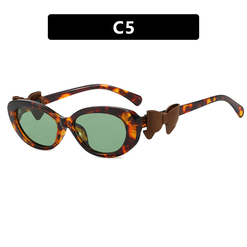 Damen modische Sonnenbrille mit verspieltem Schleifen-Design Karnz