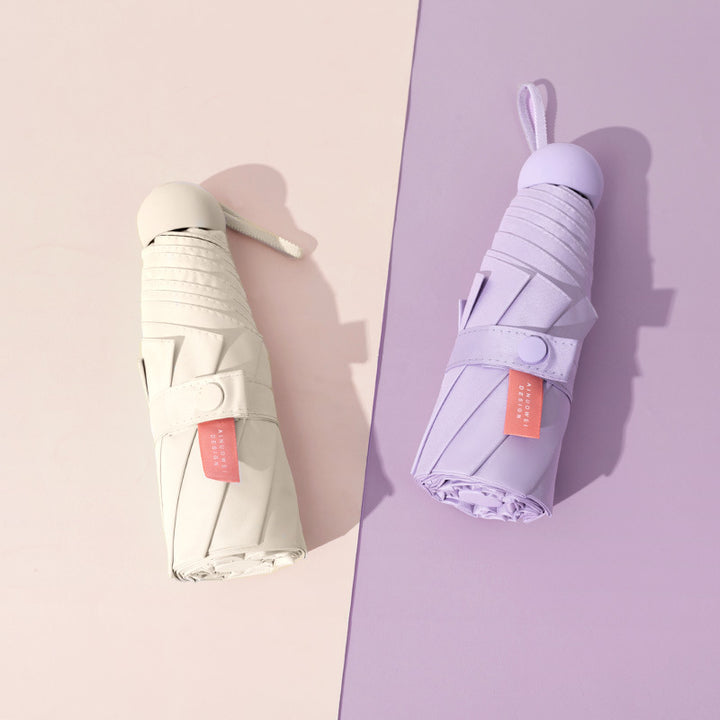 Damen handlicher UV-Schutz Falt-Regenschirm Karnz