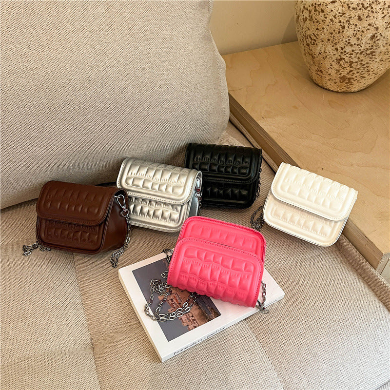 Texturiert gesteppte Mini-Crossbody-Tasche Karnz