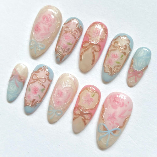 Kunstvolle Acryl Nägel mit floralen Designs Karnz