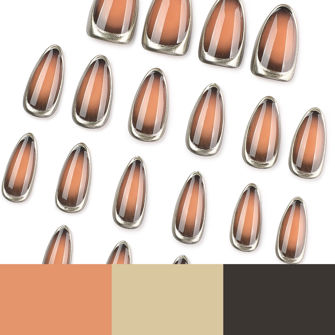 Glamouröse Stiletto-Nägel mit elegantem Goldrand Karnz