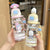 Damen Trinkflasche mit interaktivem Deckel und süßem Pochacco-Design Karnz